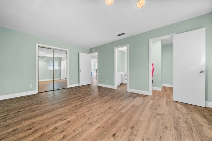 Primary Bedroom with two closets - one is walk in