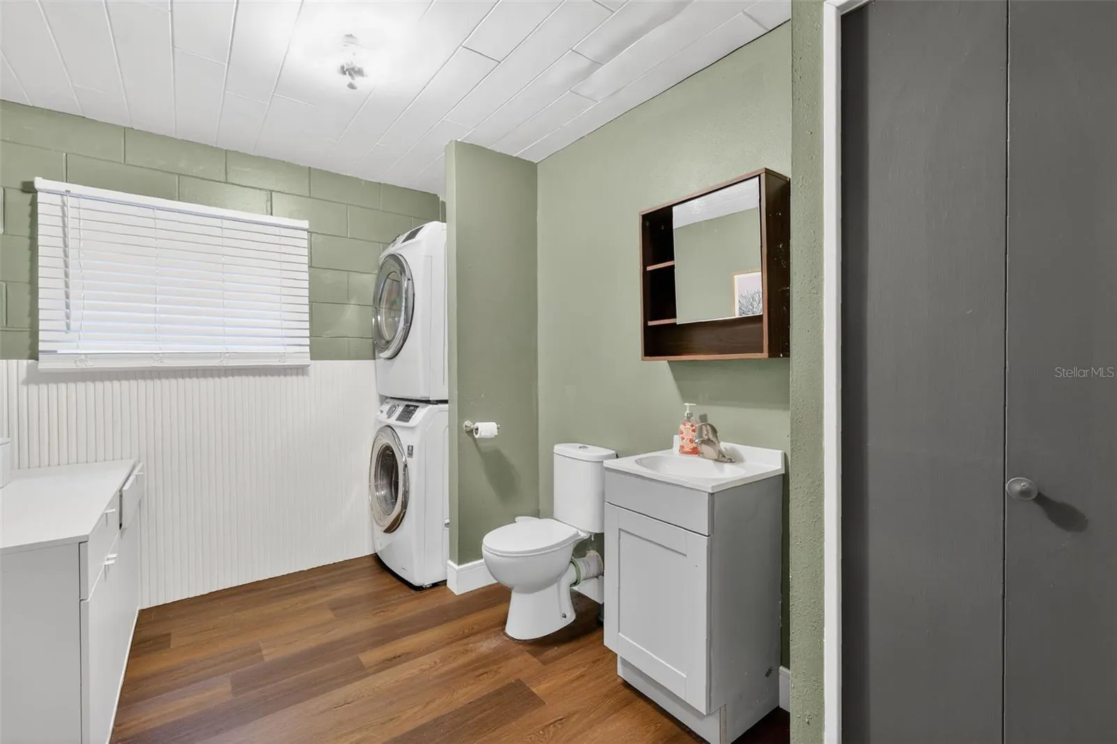 Half bath and laundry room in converted basement (not included in listed sqft)