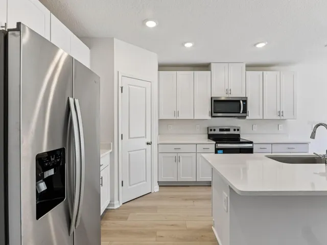 Interior photos are not of the actual home but are photos of the builder home with the same floorplan with similar interior finishes and features.