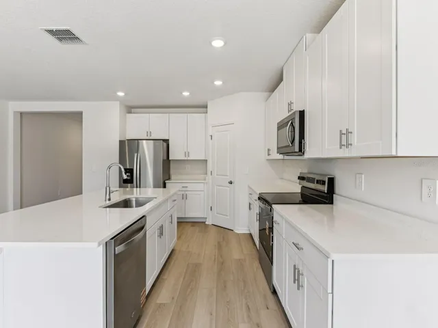 Interior photos are not of the actual home but are photos of the builder home with the same floorplan with similar interior finishes and features.