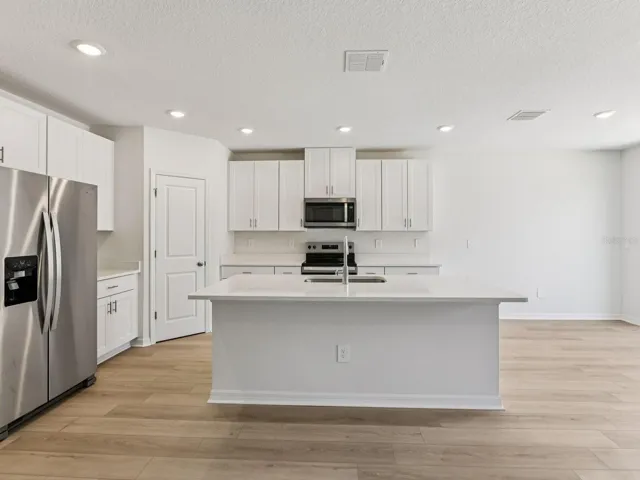 Interior photos are not of the actual home but are photos of the builder home with the same floorplan with similar interior finishes and features.