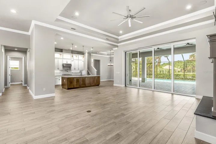 FAMILY ROOM W/ POOL VIEWS