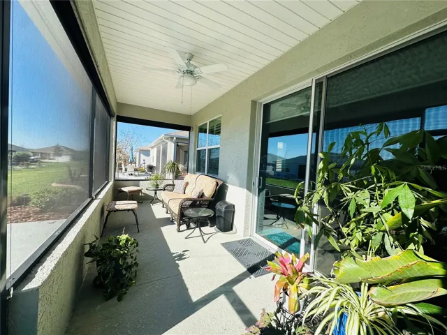 SCREENED PORCH OVERLOOKS GARDEN