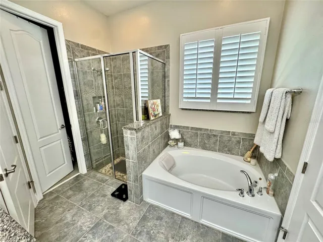 Master Bathroom with Shower, Bath Tub, Walk in Closet, and  Private Toilet Room