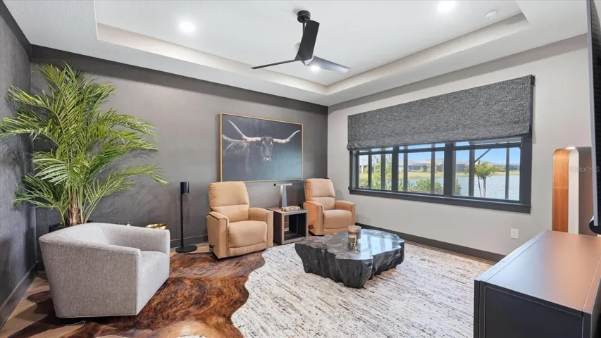 Primary bedroom being used as a home theater