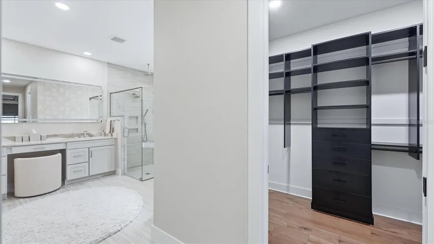 Primary bathroom, primary walk-in closet