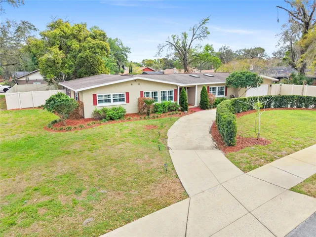 Front Exterior of the home with private circular driveway