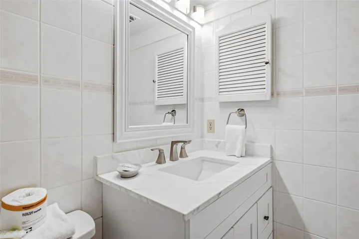 Guest Bathroom with single sink vanity