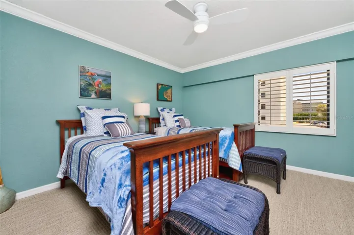 LUSH CARPET, PLANTATION SHUTTTERS AND CROWN MOLDING IN ALL THE BEDROOMS