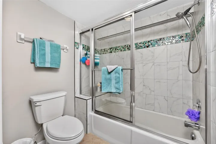 GUEST BATH HAS A SEPARATE ROOM FOR THE TUB/SHOWER AND TOILET