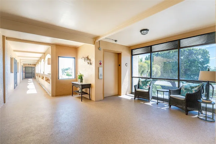 2ND FLOOR ELEVATOR LOBBY AND WALKWAY TO THE UNIT AT THE END