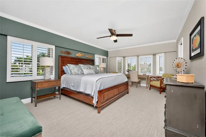 LUSH CARPET AND PLANTATION SHUTTERS.