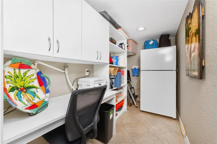BUTLERS PANTRY WITH A DESK AND EXTRA REFIGERATOR STAYS!
