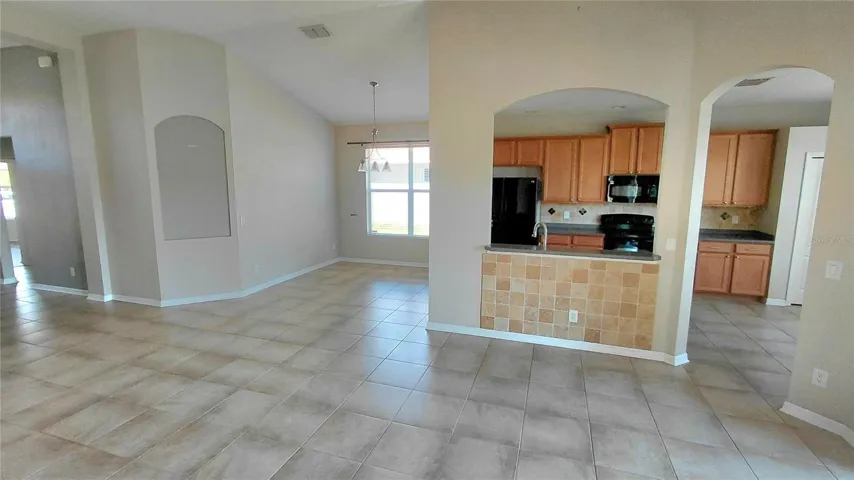 Great room looking towards kitche and dining cove
