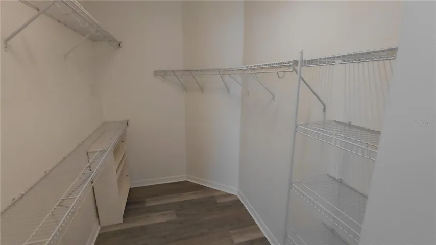 primary bedroom walk in closet