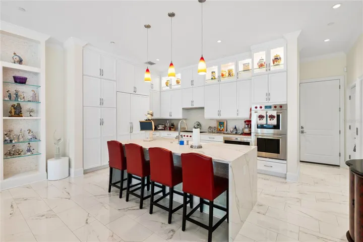 1 Palm Ter Kitchen with waterfall granite island