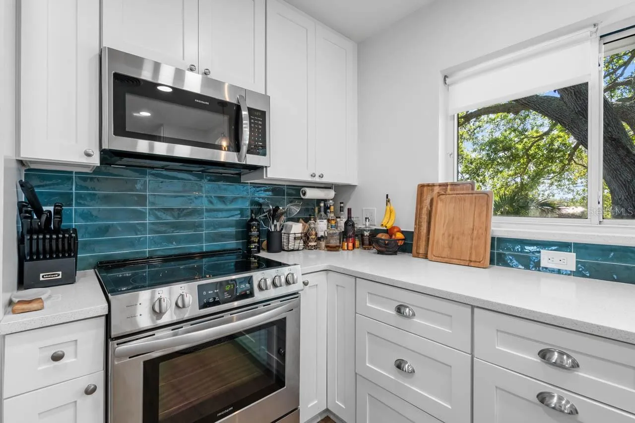 Renovated kitchen/Quartz counters, wood cabinets