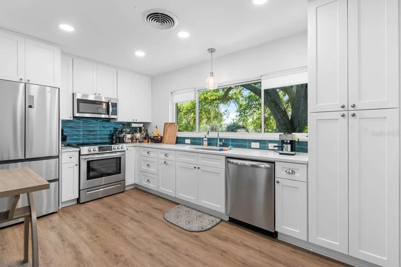 Renovated kitchen/Quartz counters, wood cabinets