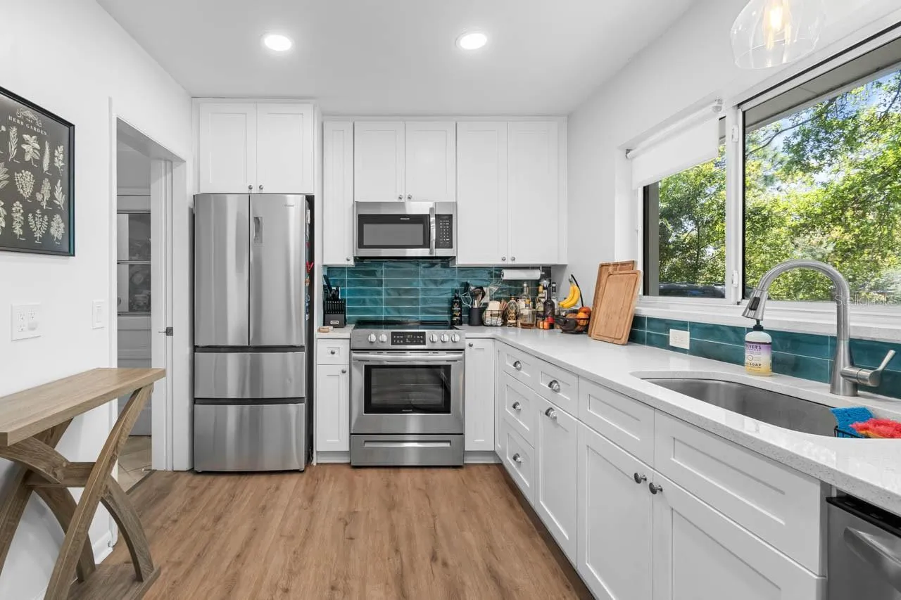 Renovated kitchen/Quartz counters, wood cabinets