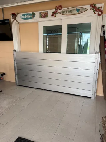 Lanai sliding glass doors protected