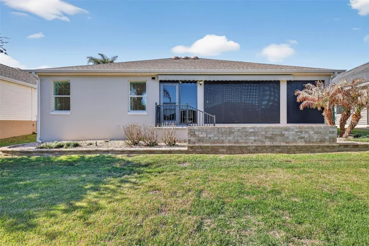 Rear yard stretches only a few feet beyond rear patio.