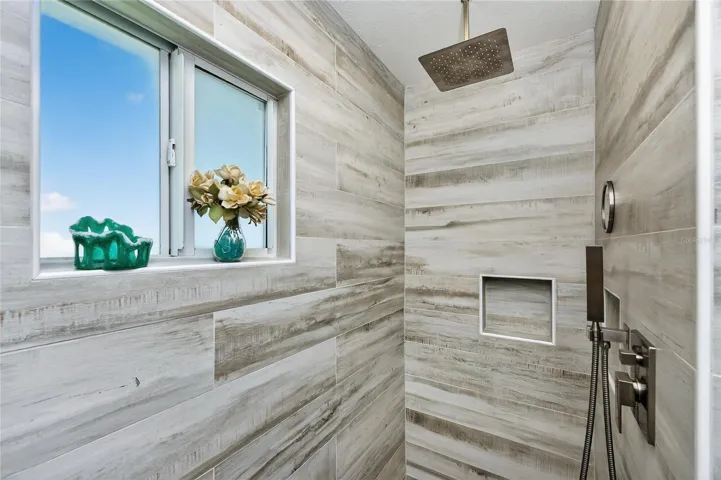 Floor to Ceiling wood plank tile shower
