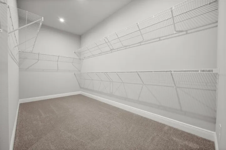 Spacious walk in closet with