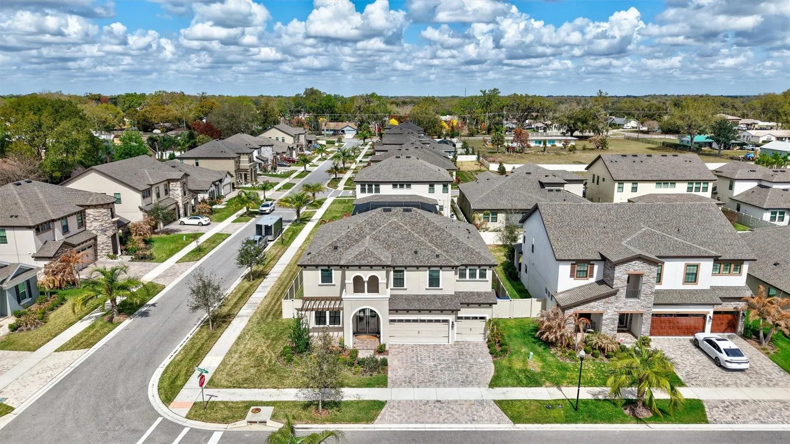 Positioned on a corner lot with a fully fenced backyard, you get both privacy and space.