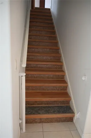 Stairs to the upper private bonus room