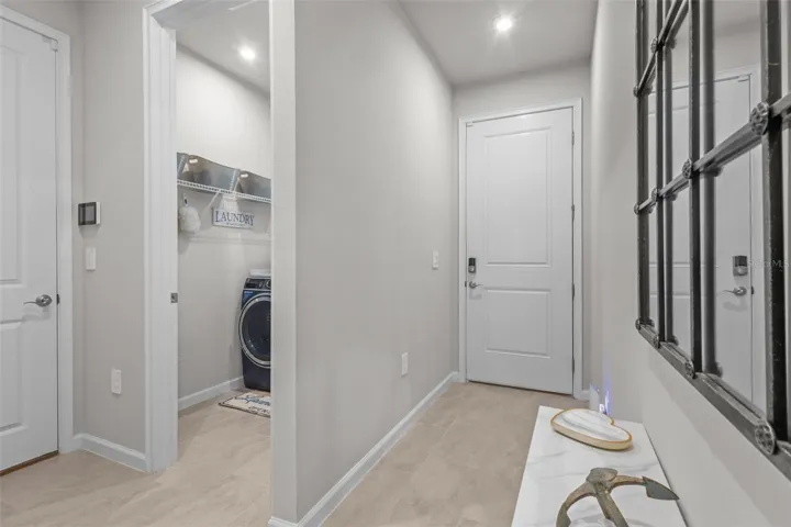 Bright entry welcoming you into the home with a clear view toward the main living area.