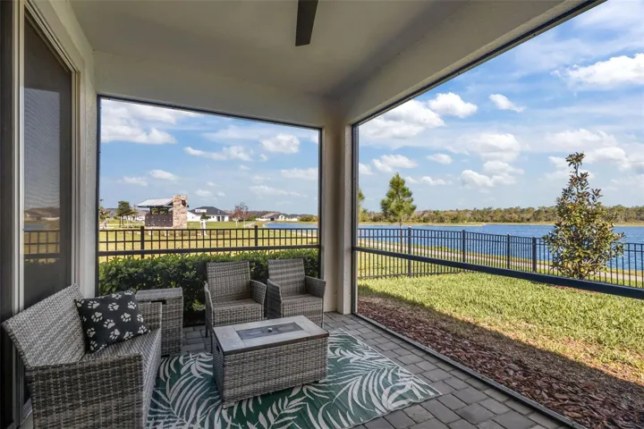 Screened-in lanai designed for relaxing and enjoying the outdoor setting.