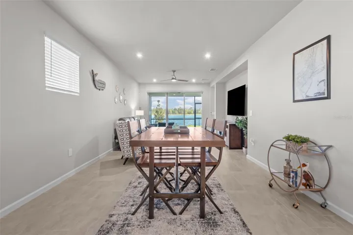 The open-concept layout keeps the kitchen, dining, and living spaces connected while showcasing the beautiful views.