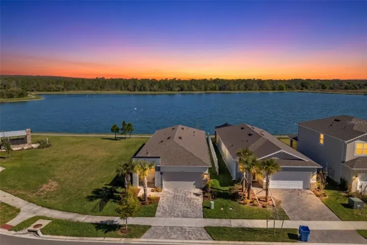 2024 Mattamy-built home on one of the best lots in Chapel Crossings with wide water views and exceptional privacy.