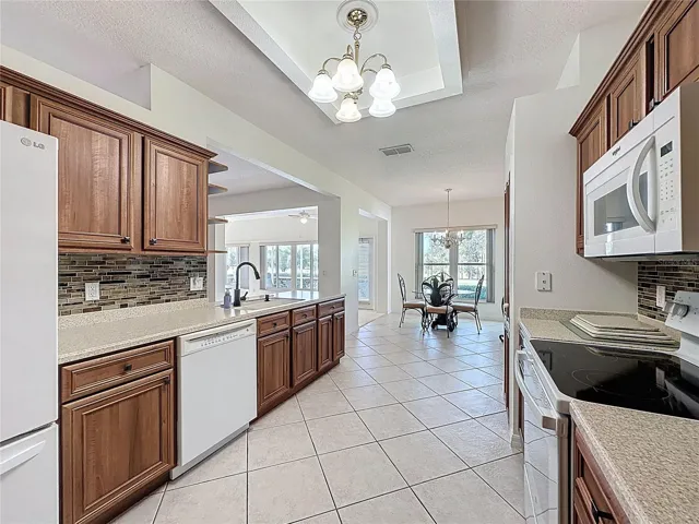 Kitchen has a separate breakfast nook area