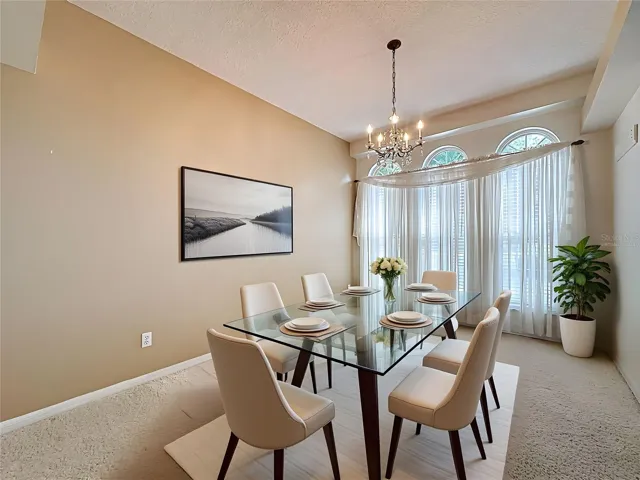 Virtually staged. Dining room