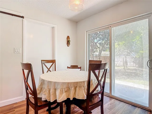 dining space overlooking backyard