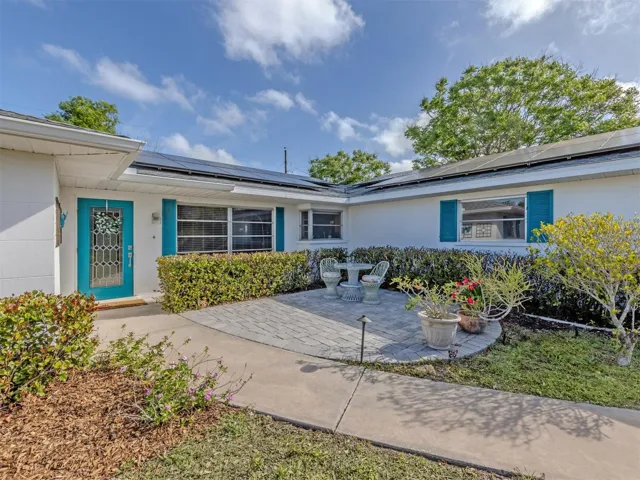 Front entrance with dining patio