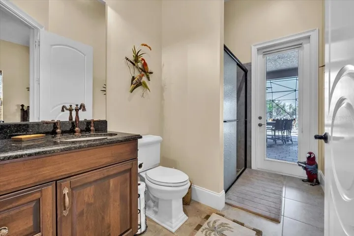 THIRD BATHROOM WITH POOL ACCESS