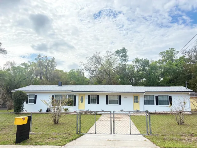 Front of house facing north, separate entrance. Front and back doors.