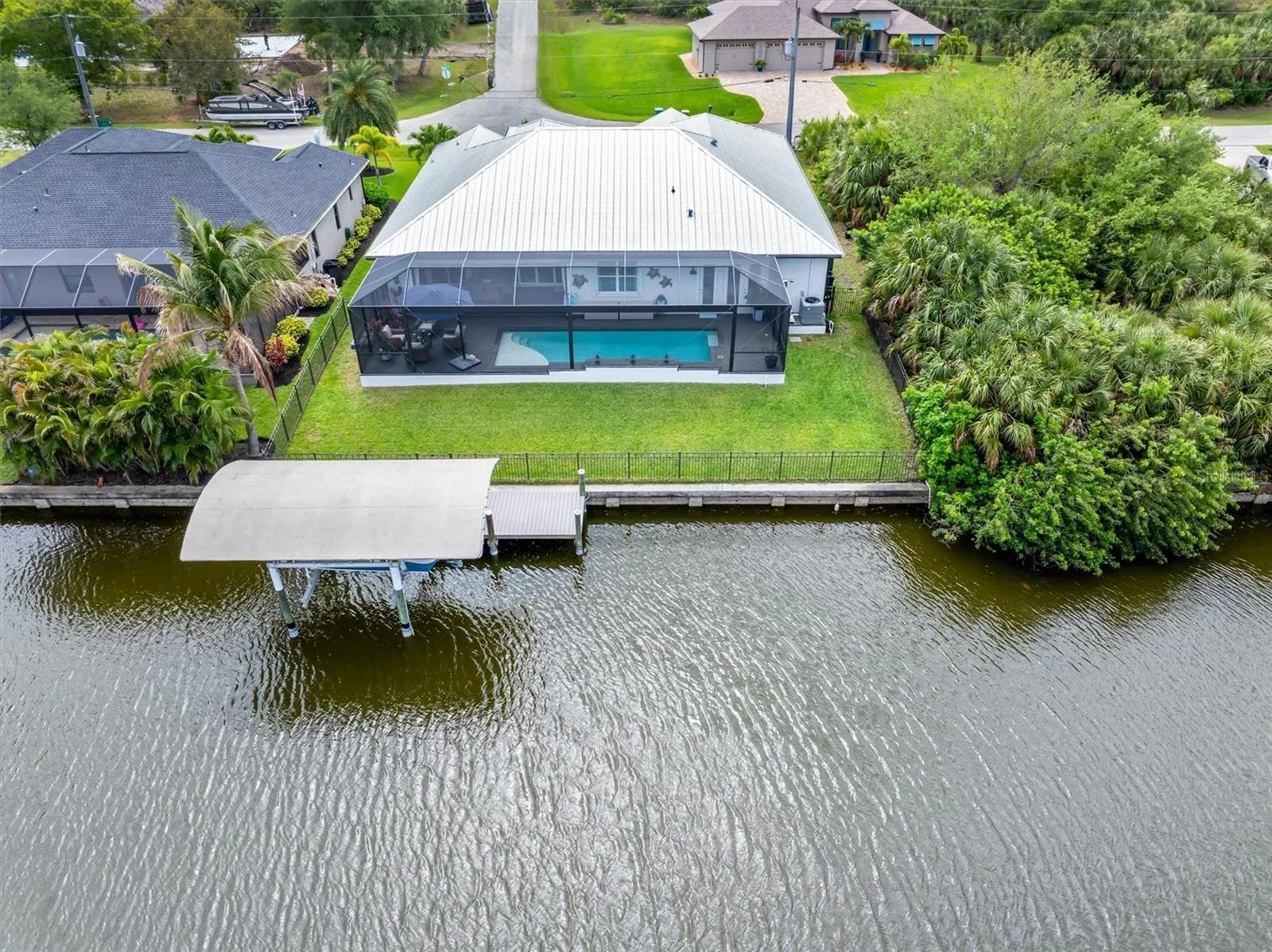 Arial of Home with Home, Dock, & Lift