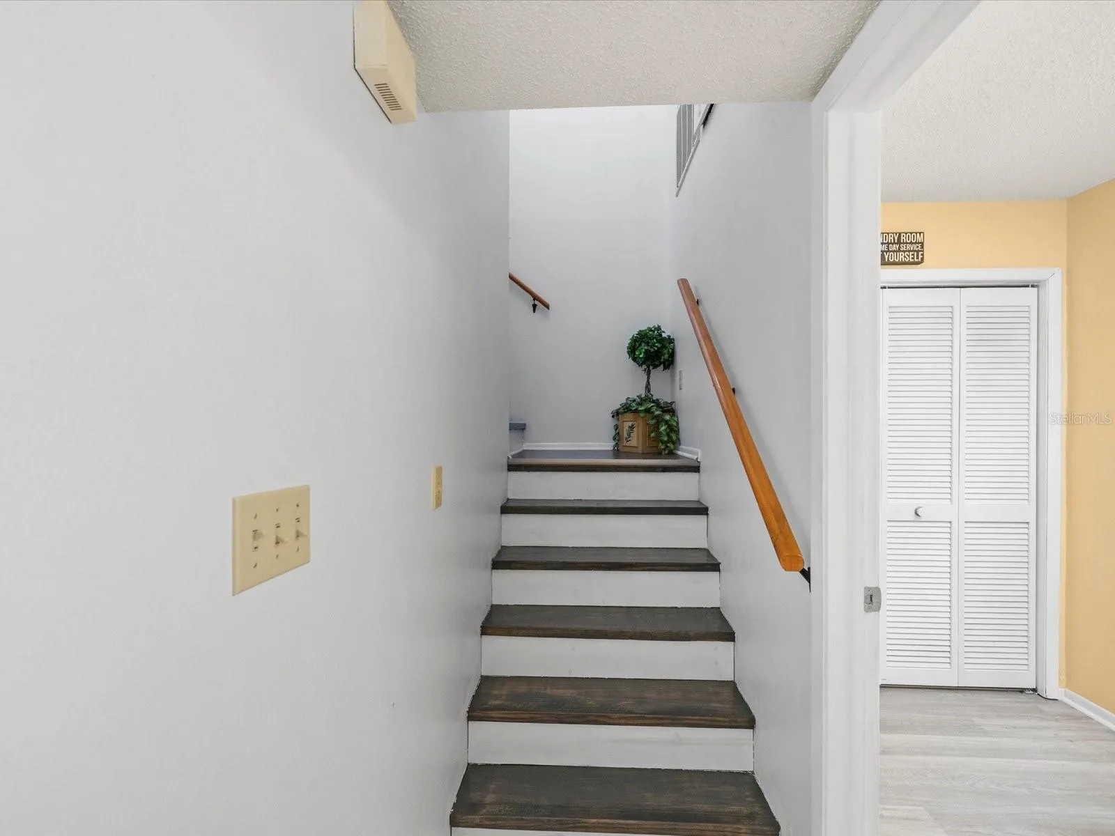 Stairs leading to the second Primary Bedroom