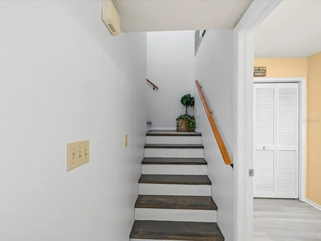 Stairs leading to the second Primary Bedroom