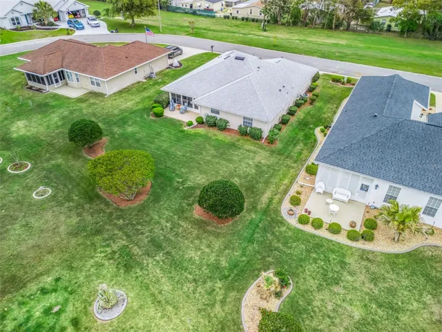 Front of the Home Faces Open Green Space