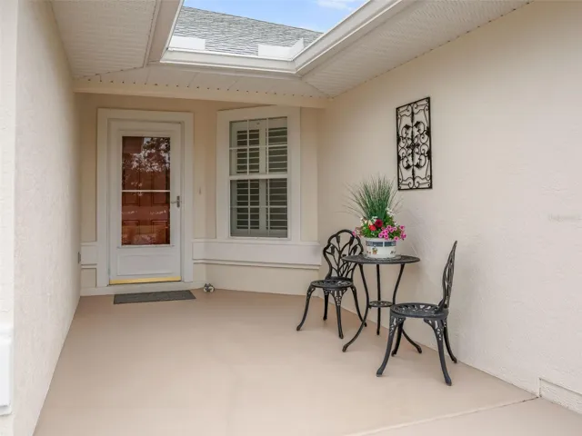 Covered Front Entrance w/Storm Door