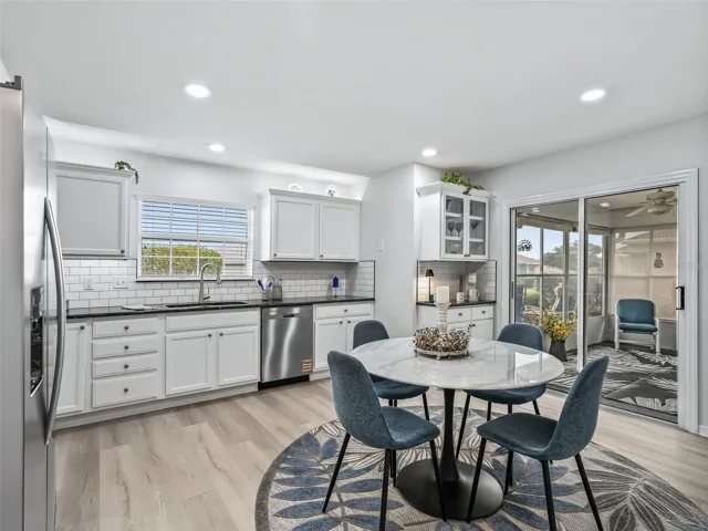 Kitchen w/Access to Lanai & Professionally Updated Cabinets