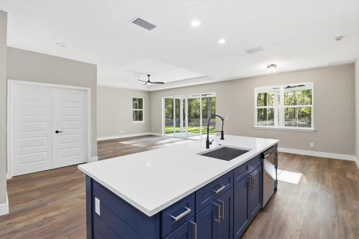 Kitchen looking over dinning and great room