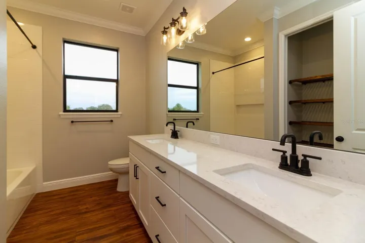 Guest Bath - Photos shown are of a previously built home. Options, colors, and pricing will differ.