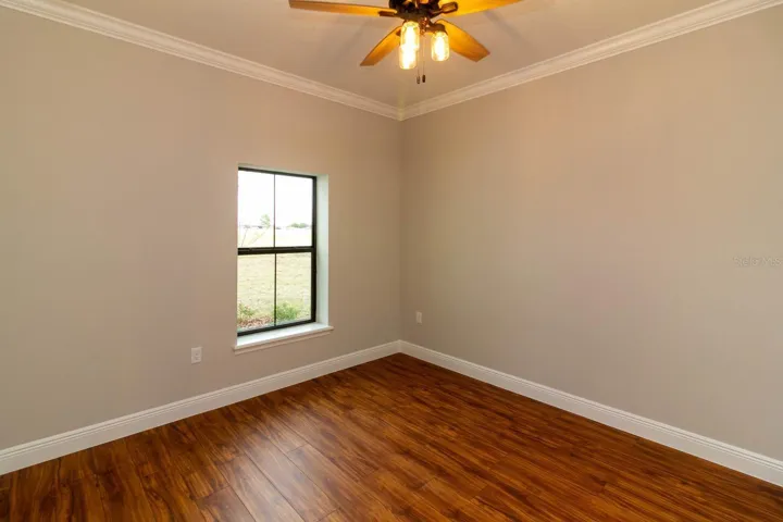 Guest Bedroom 1 - Photos shown are of a previously built home. Options, colors, and pricing will differ.