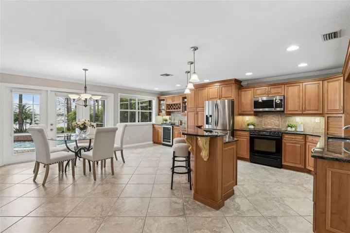 Kitchen and dining area are bright and open with incredible views!