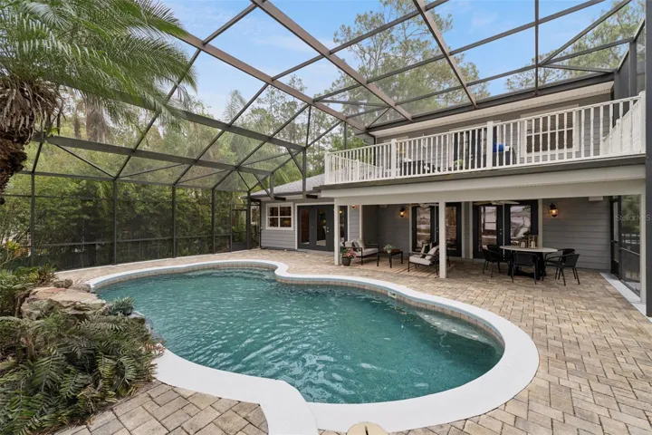 Balcony, lanai and a screened pool.